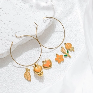 Enamel flower heart and butterfly charms set on gold stainless steel hoop earrings