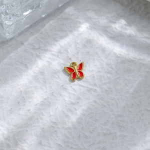 Golden butterfly pendant with red enamel details for DIY jewelry necklaces and bracelets