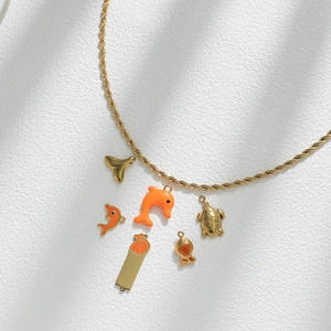 Gold twisted rope necklace with ocean dolphin, sea turtle and shell charms for DIY jewelry
