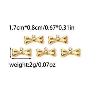 Set of five gold bone-shaped stainless steel charms for DIY jewelry 1.7cm by 0.8cm size
