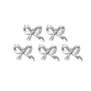 Set de cinco colgantes de lazo en acero inoxidable pulido para joyería y accesorios DIY
