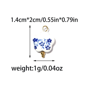 Blue and white porcelain flower pendant with dimensions 1.4x2cm and golden bail