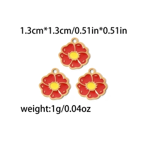 Three red and yellow enamel flower charms in gold stainless steel for jewelry making