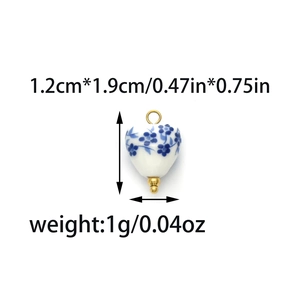 Blue floral ceramic heart pendant charm with gold metal loop and size measurements