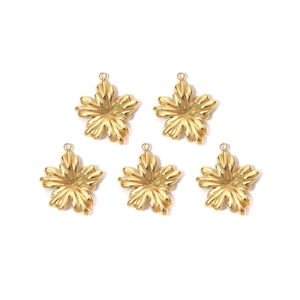 Detailed view of five gold flower pendants made of 304 stainless steel with top hanging rings