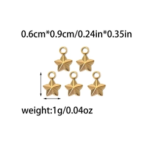 Detail of 18K gold stainless steel star pendants with geometric facets and rings