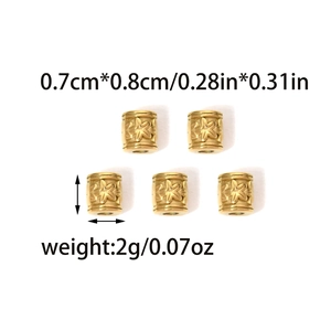 Detail view of five gold-plated floral spacer beads for DIY jewelry making accessories