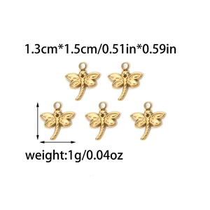 Macro view of gold dragonfly pendants with size 1.3x1.5cm and 1g weight detail