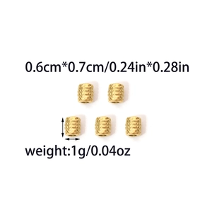 Detailed macro view of five vintage golden carved beads for DIY jewelry making and crafts