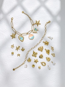 Détails de breloques en acier inoxydable doré 18 carats avec tortues et étoiles de mer