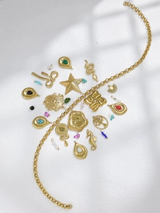 Collection of 18K gold stainless steel pendants with natural stones and thick link chain
