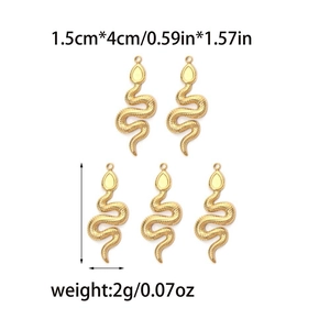 Detail view of 18K gold snake pendants with dimensions of 1.5cm by 4cm and weight of 2g