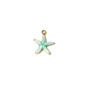 Detail shot of light green enamel starfish pendant with gold edge and metal hanging ring