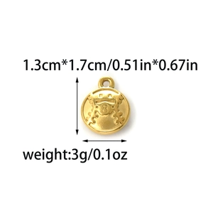 Detailed view of an 18K gold plated baseball pendant showing dimensions 1.3cm by 1.7cm