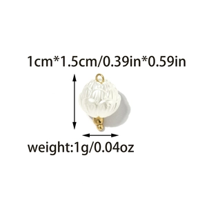 Detail of white lotus flower pendant with gold accents and 1cm x 1.5cm size markings