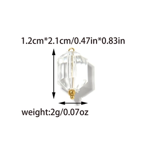 Detailed view of 1.2x2.1cm clear faceted geometric crystal pendant with gold metal caps