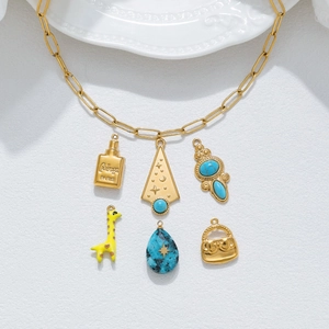 Ciondoli Fai da Te in Acciaio Inossidabile per Creazione Gioielli Oro Boccetta Profumo Giraffa Borsa Stella Luna Triangolo Turchese Charms