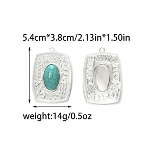 Retro ethnic stainless steel pendant set with turquoise stone on white background