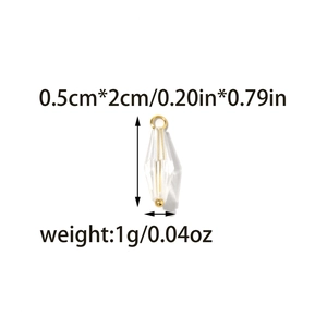 Detailed view of a 2cm transparent prism pendant with gold caps and size specifications