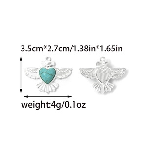 Vintage eagle pendant with turquoise heart inlay and engraved star details in silver finish