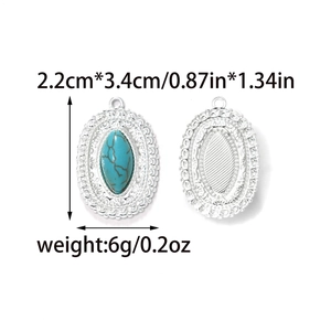 Vintage oval stainless steel pendant with turquoise inlay and hollow pattern engraving