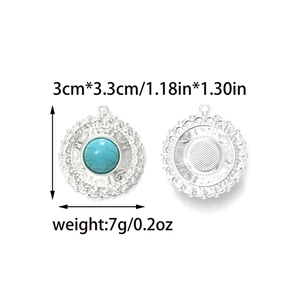 Detail of round vintage turquoise pendant with silver floral carving and size dimensions