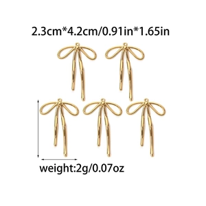 Vista de 5 colgantes de lazo dorado de 2,3x4,2 cm para la creación de joyería artesanal DIY