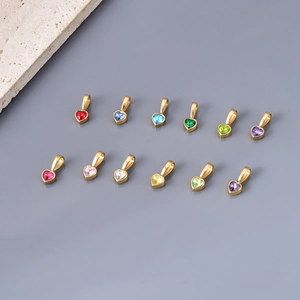 Set of twelve heart-shaped colorful zircon pendants with gold-plated metal base for DIY jewelry
