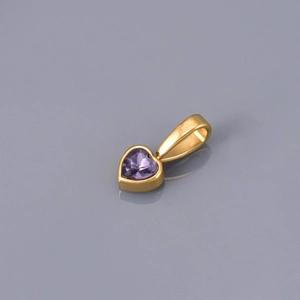 Elegant gold-plated heart-shaped pendant with a sparkling purple zircon gemstone