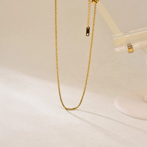 Collier en perles d'acier inoxydable doré minimaliste avec extension réglable élégante