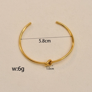 Golden knot open bangle bracelet with 5.8cm inner diameter in polished stainless steel