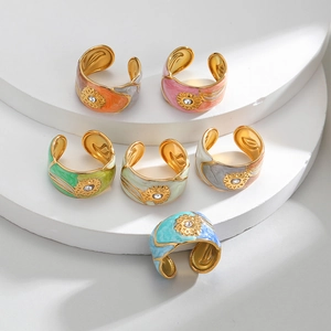 Adjustable gold plated enamel rings set with sun flower relief and zircon details
