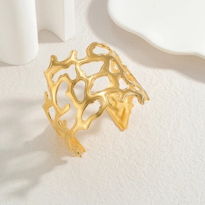 Artistic gold coral-inspired hollow cuff bracelet with unique irregular branch design