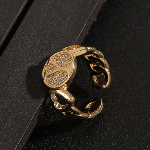 Golden peace sign ring with sparkling zircon stones and chain-style adjustable band