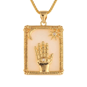 Gold rectangular pendant with moon sun and hamsa hand design on a box chain necklace