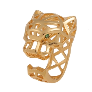 Macro view of gold-plated leopard ring featuring hollow head design and green zircon eyes