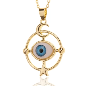 Bohemian gold necklace featuring a blue evil eye pendant with celestial star and moon motifs