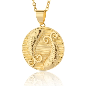 Macro view of 18K gold plated Pisces zodiac medallion pendant with high polish finish