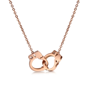 Elegant rose gold handcuff necklace with sparkling zircon accents on white background