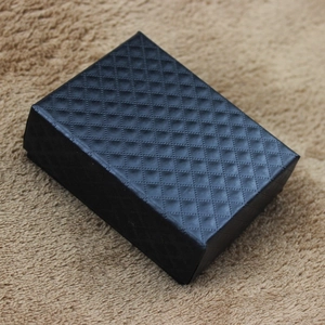 Premium black jewelry gift box with textured diamond pattern for necklaces and sets