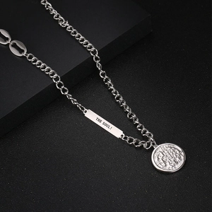 Silver steel OT buckle necklace with rectangular soul pendant and coin charm on black base