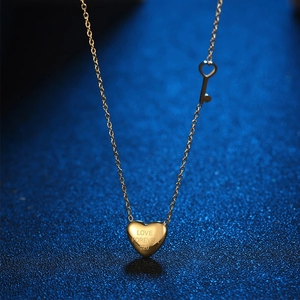 Gold heart lock necklace with key pendant and Love Forever 520 engraving on star background
