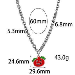 Macro view of punk pumpkin pendant showing asymmetric chain texture and size dimensions