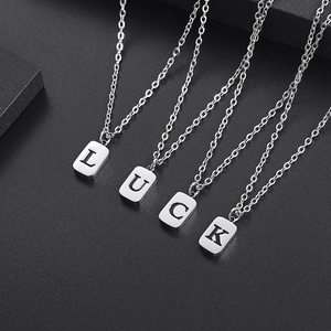 LUCK engraved rectangle pendant necklaces in silver stainless steel with cable chains