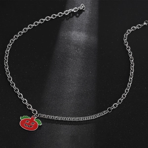 Silver pumpkin pendant necklace with dual-style titanium steel chains on black background