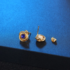Gold round spiral flower earrings with deep blue central stone and butterfly backings
