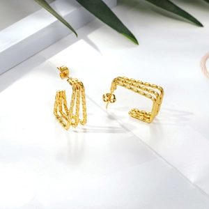 Triple twisted golden square hoop earrings with minimalist geometric layered design