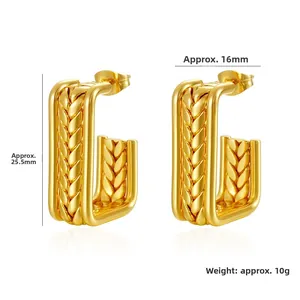 Detail view of gold geometric earrings with braided texture and size measurements