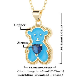 Detailed view of light blue enamel bear pendant with heart zircon and dimensions measurement