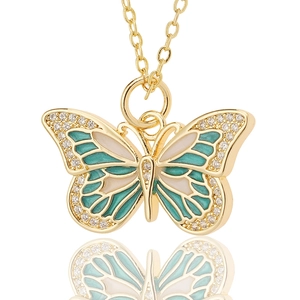 Gouden vlinderketting met blauwgroen emaille en glinsterende strass steentjes